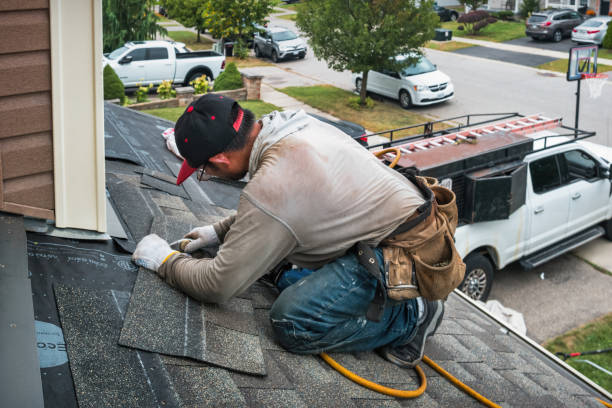 Professional Roofing technician working in Adamsburg, PA
